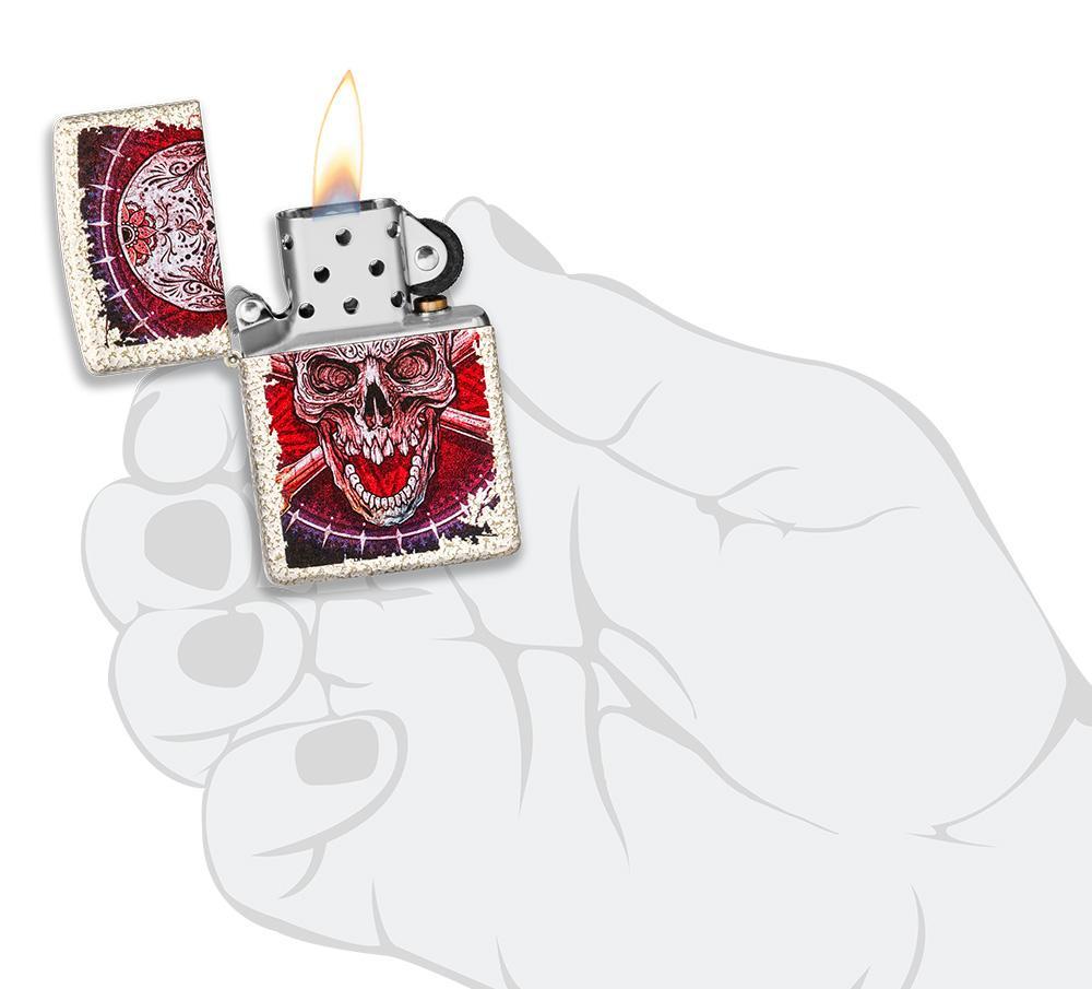 Skull Design Mercury Glass Windproof Lighter lit in hand